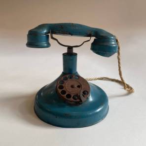 A Enamelled Tole Telephone